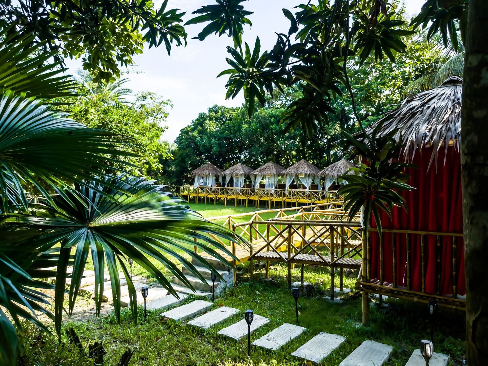 Forest pathway through the Arshinagar Resort grounds
