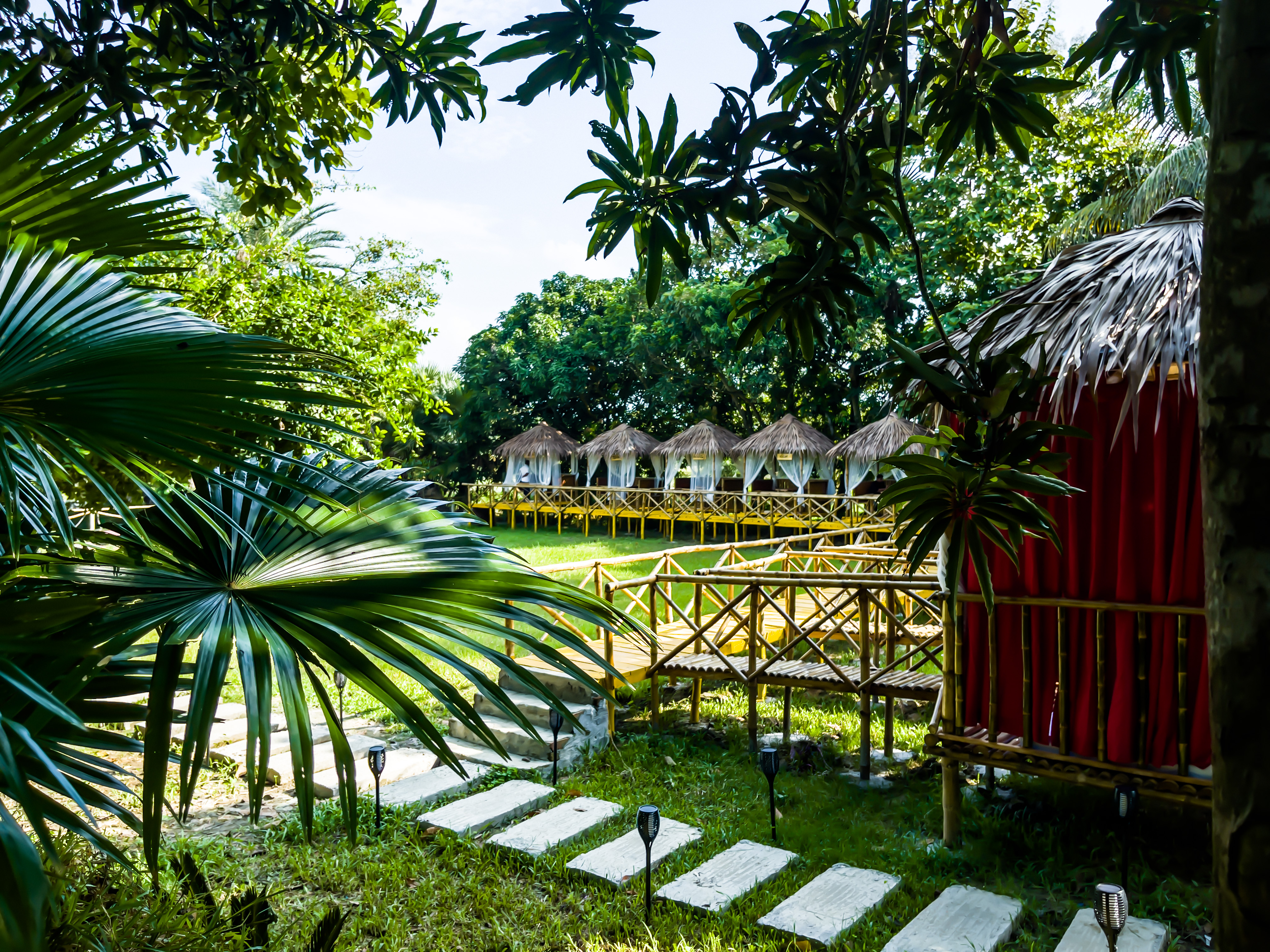 Arshinagar Resort cottages under the Gazipur forest canopy